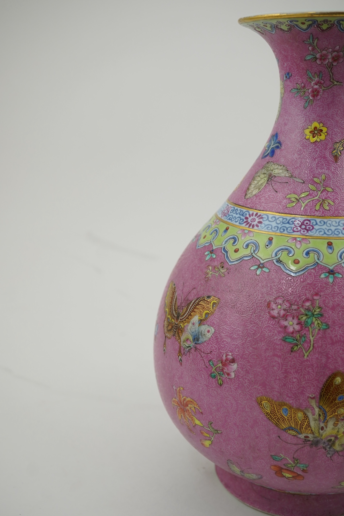 A Chinese pink-ground sgraffito pear-shaped vase, yuhuchunping, Daoguang six character seal mark and of the period (1821-50)